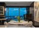 Cozy dining area with city skyline views and contemporary design at 3344 Peachtree Ne Rd # 3405, Atlanta, GA 30326