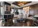 Contemporary dining room with sleek, modern table set, accented by dark wood floors and walls at 3344 Peachtree Ne Rd # 3405, Atlanta, GA 30326
