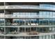 Multi-level building with spacious balconies and expansive glass windows showcases modern architectural design at 3344 Peachtree Ne Rd # 3405, Atlanta, GA 30326
