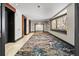 Modern hallway with unique design, access to elevators, and a stunning window view at 3344 Peachtree Ne Rd # 3405, Atlanta, GA 30326