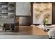 Close up of modern kitchen bar countertop, with art and dining table in view at 3344 Peachtree Ne Rd # 3405, Atlanta, GA 30326
