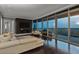 Bright living room with floor-to-ceiling windows and dark hardwood floors, perfect for relaxing and entertaining at 3344 Peachtree Ne Rd # 3405, Atlanta, GA 30326