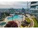 Rooftop pool and lounge area featuring cityscape views from a luxurious building at 3344 Peachtree Ne Rd # 3405, Atlanta, GA 30326