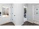 Stylish entryway with a glass-paneled door providing natural light, and access to a bedroom at 440 Madison Lakeview Dr, Acworth, GA 30102