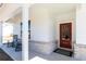 Inviting front porch showcases classic rocking chairs and a red door with decorative glass panels at 440 Madison Lakeview Dr, Acworth, GA 30102