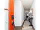 Bright entry hallway with elegant decor and wood-look flooring leads into the inviting living space at 440 Madison Lakeview Dr, Acworth, GA 30102