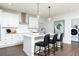 Bright kitchen with stainless steel appliances, ample storage, and an island with barstool seating at 440 Madison Lakeview Dr, Acworth, GA 30102