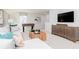Inviting living room features a couch, foosball table and large television at 440 Madison Lakeview Dr, Acworth, GA 30102