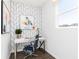 Cozy home office space featuring modern decor, stylish wallpaper, and a comfortable workspace at 440 Madison Lakeview Dr, Acworth, GA 30102