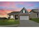 Beautiful single-Gathering home with a well-manicured lawn and an attached two-car garage at 48 Masters Dr, Villa Rica, GA 30180