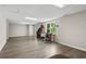 Finished basement featuring durable flooring, large windows, and lots of space for entertaining and relaxing at 1645 Oakfield Ln, Roswell, GA 30075