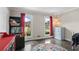 Cozy bedroom with two windows and hardwood floors at 1645 Oakfield Ln, Roswell, GA 30075