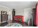 Another view of cozy bedroom with colorful accents and hardwood floors at 1645 Oakfield Ln, Roswell, GA 30075