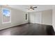 Expansive bedroom with large windows, hardwood floors, and ample closet space at 1645 Oakfield Ln, Roswell, GA 30075