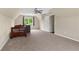 Bedroom featuring neutral paint, carpet, one window, a bed, and closet at 1645 Oakfield Ln, Roswell, GA 30075