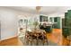 Eat in kitchen featuring granite countertops, green cabinets, and stainless steel appliances at 1652 Oak Grove Rd, Decatur, GA 30033