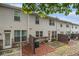 View of the backyard with patios and an air conditioning unit at 2294 Spicy Pine Ln, Lawrenceville, GA 30044