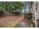 Spacious backyard with a privacy fence and air conditioning unit at 2294 Spicy Pine Ln, Lawrenceville, GA 30044