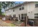 View of the backyard featuring a privacy fence and patio area, perfect for outdoor entertaining at 2294 Spicy Pine Ln, Lawrenceville, GA 30044