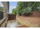 Private backyard featuring a cozy patio and fenced perimeter for relaxation and outdoor enjoyment at 2294 Spicy Pine Ln, Lawrenceville, GA 30044