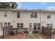 Backyard with concrete patios and privacy fence at 2294 Spicy Pine Ln, Lawrenceville, GA 30044