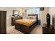 Cozy bedroom featuring warm carpet, curtains, and furniture at 2294 Spicy Pine Ln, Lawrenceville, GA 30044