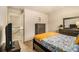 Comfortable bedroom with neutral walls, warm carpet, and furniture at 2294 Spicy Pine Ln, Lawrenceville, GA 30044
