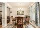 Bright dining area with stylish decor, large window, and convenient access to living room at 2294 Spicy Pine Ln, Lawrenceville, GA 30044