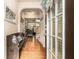 Inviting foyer with hardwood floors, bench seating, and an archway leading to the living area at 2294 Spicy Pine Ln, Lawrenceville, GA 30044