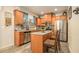Charming kitchen with stainless steel appliances, granite countertops, and a cozy central island with seating at 2294 Spicy Pine Ln, Lawrenceville, GA 30044