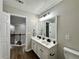 Double vanity bathroom with modern fixtures, offering style and functionality at 608 Chickory Ct, Woodstock, GA 30188