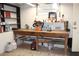 Basement area featuring a workbench, shelves, and painted walls; perfect for DIY projects and storage at 728 Antone Nw St, Atlanta, GA 30318