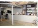 Basement area with painted walls and ceilings, offering plenty of storage space and a clean aesthetic at 728 Antone Nw St, Atlanta, GA 30318