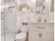 Bright bathroom featuring a glass-enclosed shower, stylish fixtures, and a modern vanity at 728 Antone Nw St, Atlanta, GA 30318