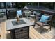 Inviting deck with seating and a gas fire pit, offering a relaxing outdoor space for gatherings at 728 Antone Nw St, Atlanta, GA 30318