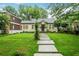 Charming single-story home with a well-manicured lawn and inviting walkway at 728 Antone Nw St, Atlanta, GA 30318