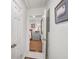 Hallway view leading into a bedroom, showcasing neutral tones and a cozy atmosphere at 728 Antone Nw St, Atlanta, GA 30318