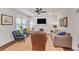 Bright and inviting living room featuring large windows and cozy furniture at 728 Antone Nw St, Atlanta, GA 30318