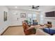 Inviting living room with a decorative fireplace, neutral walls and comfortable seating at 728 Antone Nw St, Atlanta, GA 30318