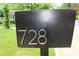 Modern mailbox displaying the house number 728 in a well-maintained yard at 728 Antone Nw St, Atlanta, GA 30318