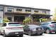 Chattahoochee Food Works exterior featuring multiple eateries and parking at 728 Antone Nw St, Atlanta, GA 30318