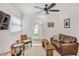 Cozy sitting area features comfortable seating, natural light, and a view of the backyard at 728 Antone Nw St, Atlanta, GA 30318