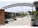 Street view of commercial buildings with ample parking under an archway at 728 Antone Nw St, Atlanta, GA 30318