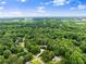 Drone-eye view of the neighborhood, GA400 highway, hospital, and houses at 1340 Gran Forest Dr, Cumming, GA 30041