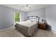Cozy bedroom featuring a metal bed frame and natural light at 1340 Gran Forest Dr, Cumming, GA 30041