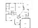 Downstairs floor plan showcasing bedrooms, kitchen, bathrooms, dining area, and garage at 1340 Gran Forest Dr, Cumming, GA 30041