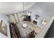 Spacious living room boasts a fireplace, ample seating, and a ceiling fan at 1340 Gran Forest Dr, Cumming, GA 30041