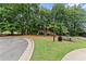 Community playground with swings and slides that offers a safe and fun play area for children at 1340 Gran Forest Dr, Cumming, GA 30041