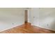 This bedroom features hardwood floors, two closets, and freshly painted walls at 1960 Oak Leaf Sw Ct, Marietta, GA 30008