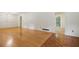 Bright living room featuring hardwood floors and an open layout, perfect for entertaining at 1960 Oak Leaf Sw Ct, Marietta, GA 30008